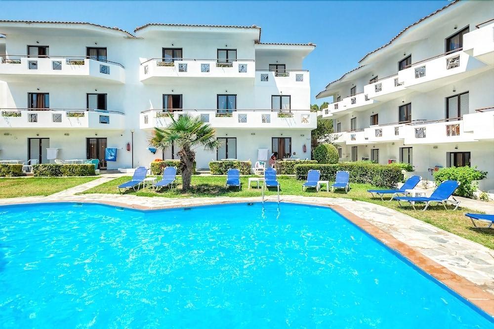 Xenios Dolphin Beach Hotel Посиди Экстерьер фото