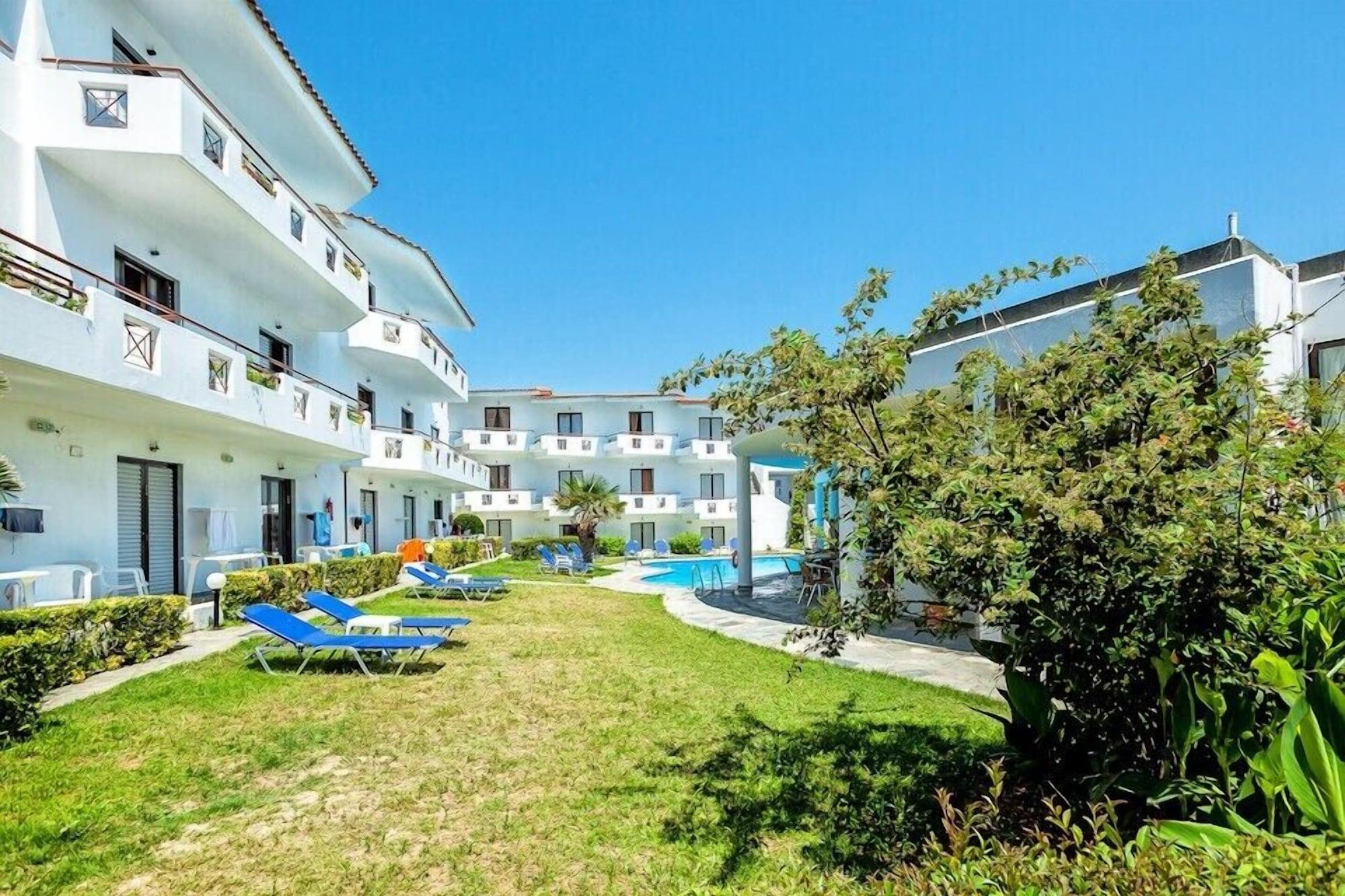Xenios Dolphin Beach Hotel Посиди Экстерьер фото