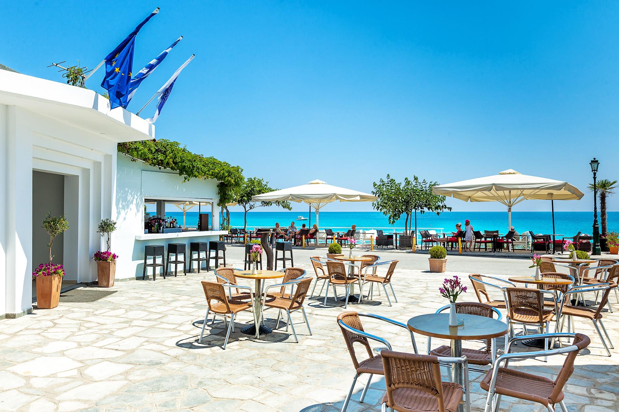 Xenios Dolphin Beach Hotel Посиди Экстерьер фото