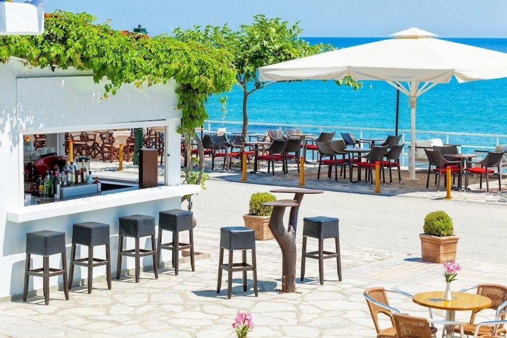 Xenios Dolphin Beach Hotel Посиди Экстерьер фото