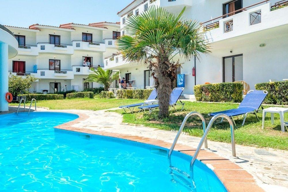 Xenios Dolphin Beach Hotel Посиди Экстерьер фото